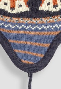 Knit cap featuring striped blue and brown design with fox pattern, dark blue edges, and chin strap for adjustment. Soft texture.