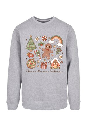 Grauer Pullover mit festlichem Design und weihnachtlichen Illustrationen: Lebkuchenmann, Baum, Geschenke, Zuckerstangen und ein Regenbogen.