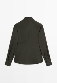Dark green long-sleeve shirt with a pointed collar, buttoned cuffs, and a smooth texture, featuring a clean, minimalist design.