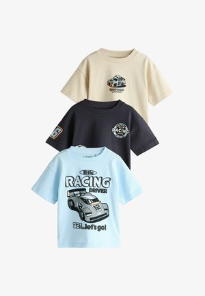 Three short-sleeve T-shirts: light beige with car graphic, dark navy with round logo, and light blue with racing car illustration and text.