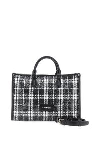 Borsa a mano a quadri bianca e nera con tessuto testurizzato, doppi manici neri, tracolla staccabile e dettaglio del logo sul davanti.