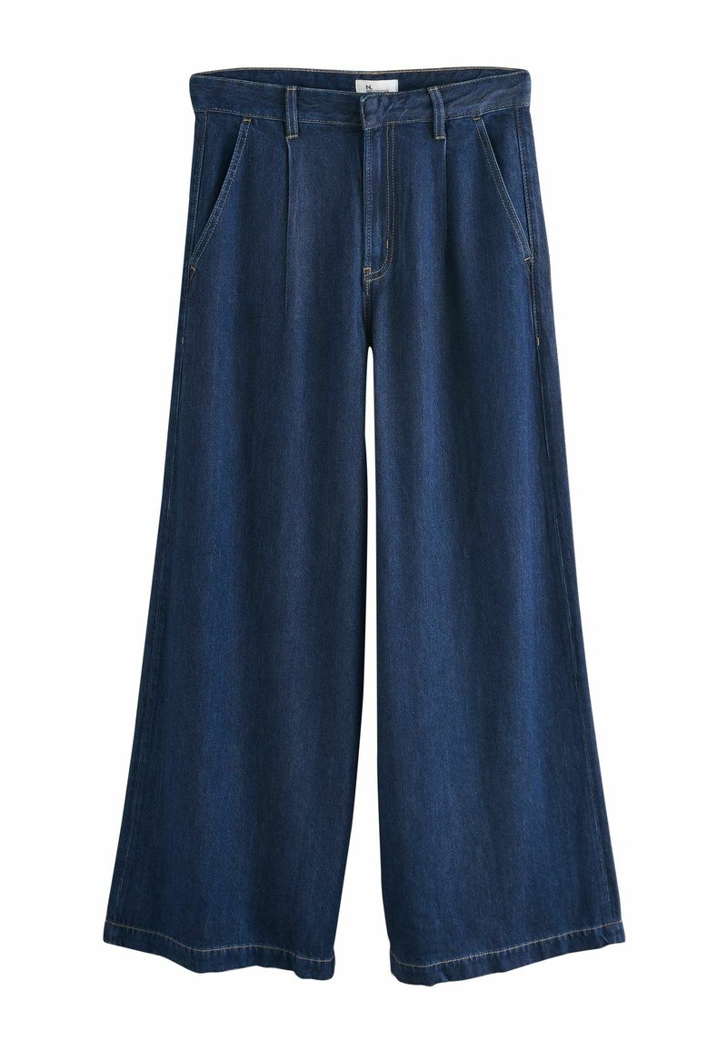 Pantaloni in denim scuro a gamba larga con pinces, cinque tasche e cuciture a contrasto. Realizzati in cotone con una superficie liscia e un design classico.