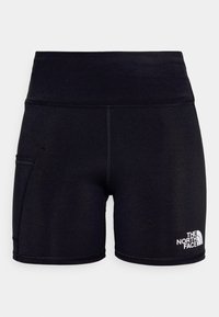 Černé sportovní šortky s vysokým pasem, vyrobené z hladkého materiálu. Obsahují boční kapsu a bílé logo na spodní přední části.