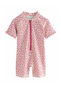 Kortärmad, rosa blommig jumpsuit med en dragkedja fram, gjord av mjukt tyg. Rynkiga ärmar och knälång design, med små gröna accenter.