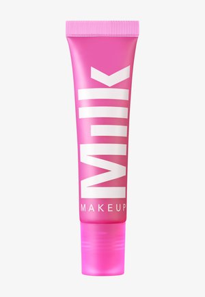 Tube rose de MILK Makeup avec une finition brillante, présentant des lettres blanches audacieuses et un capuchon cannelé. Texture lisse sans motifs visibles.