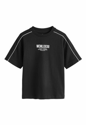 Black short-sleeve t-shirt featuring a crew neck, white text print with "MCMLXXXII" and contrasting white stripes along the shoulders.