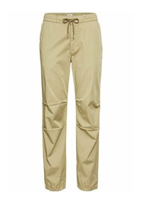 Beige leichte Hose mit Elastikbund und Kordelzug, Seitentaschen und einer lockeren Passform mit schmalen Bündchen.