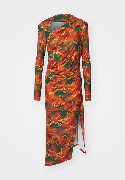 Long-sleeved dress in vibrant orange, green, and yellow abstract pattern. Fabric is smooth with draped detailing and a side slit.