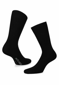 Czarne skarpetki wykonane z gładkiego, elastycznego materiału. Mają klasyczny design z prążkowanym ściągaczem i minimalnym logo na pięcie.