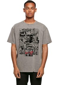 Gray oversized t-shirt, cotton blend, featuring a comic-style graphic print in black and red with action scenes and text elements.