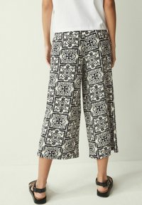 Next CULOTTES - Hlače - monochrome