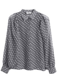 Blusa a scacchi bianca e nera con colletto, maniche puff e bottoni sul davanti. Motivo a pois su tutta la superficie.
