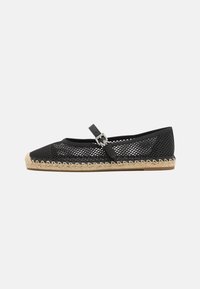 Black mesh espadrille with a rounded toe, ankle strap, and jute sole. Features a textured weave and contrasting beige edging.
