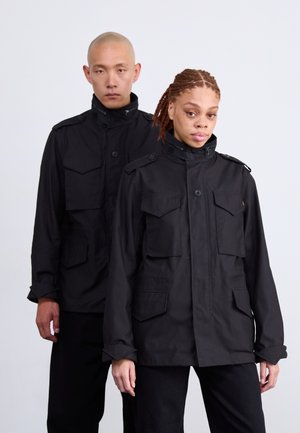 STUDIO UNISEX - Overgangsjakke - black