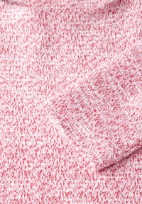 Strukturierten Stoff in verschiedenen Pinktönen mit weißen Sprenkeln; weiches, gestricktes Material; Nahaufnahme zeigt unregelmäßiges Muster und Dicke.