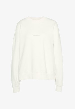 Biała bluza z okrągłym dekoltem, luźny krój, opadające ramiona i ściągacze na rękawach. Z przodu widnieje wytłoczone hasło "PEGADOR".