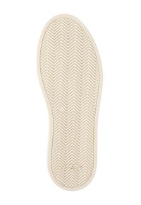 Semelle de chaussure beige clair avec un motif en chevrons, dotée d'un bout arrondi et d'un trou circulaire central. Logo "GUM TOUCH" imprimé près du talon.