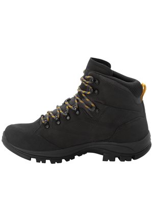 Botte de randonnée noire montante avec des lacets agrémentés de jaune, col rembourré, semelle robuste et une languette jaune au talon.