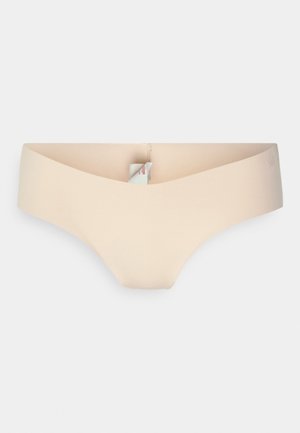 Nude hipster undertøj lavet af blødt, strækbart materiale. Har en lav talje og sømløst design med minimal branding på livremmen.