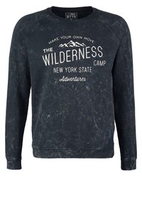 Felpa blu scuro con effetto lavaggio vintage, con testo bianco e grafica di montagna. Polsini e orlo a costine, scollo a girocollo.