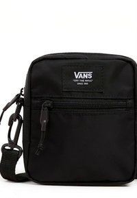Schwarze Nylon-Schultertasche mit einer Reißverschlusstasche vorne, verstellbarem Riemen und einem Vans-Logo-Patch auf der Vorderseite. Kompakte rechteckige Form.