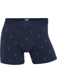 Marineblå boxer shorts lavet af blødt stof, med et gentagende mønster af lyseblå geometriske former. Elastisk talje med "DOVRE" branding.