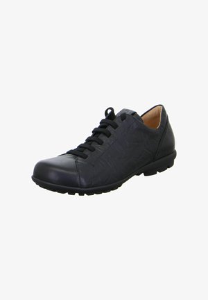 Black leather shoe with rounded toe, textured surface, and black laces; features a treaded rubber sole for grip and comfort.