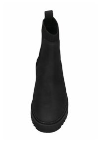 Zwarte enkelboot gemaakt van soepel leer, met een ribbelpaneel van elastiek, een ronde neus en een trekhaak aan de hiel. Ontwerp met een stevige zool.
