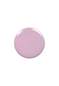 Contenitore rotondo di smalto per unghie rosa chiaro con una finitura liscia e lucida, senza texture o pattern visibili.