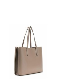 Sac fourre-tout synthétique beige à texture lisse, forme rectangulaire, deux longues anses, et détails de couture subtils, conçu pour un usage quotidien.