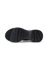 Black rubber shoe sole with textured tread featuring diamond-shaped patterns for grip. Curved edges and smooth surfaces.
