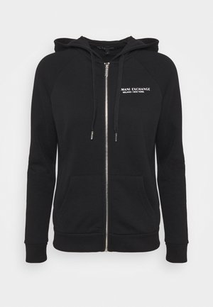 Haut à zip noir, fabriqué en tissu doux, avec un imprimé logo sur le devant, des poches kangourou et des poignets et un ourlet côtelés.