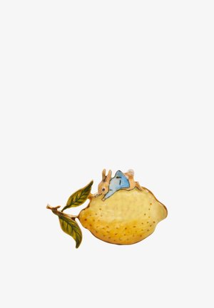 Ceramic brooch shaped like a lemon with a small rabbit figure atop, featuring yellow and green colors, glossy finish, and detailed accents.