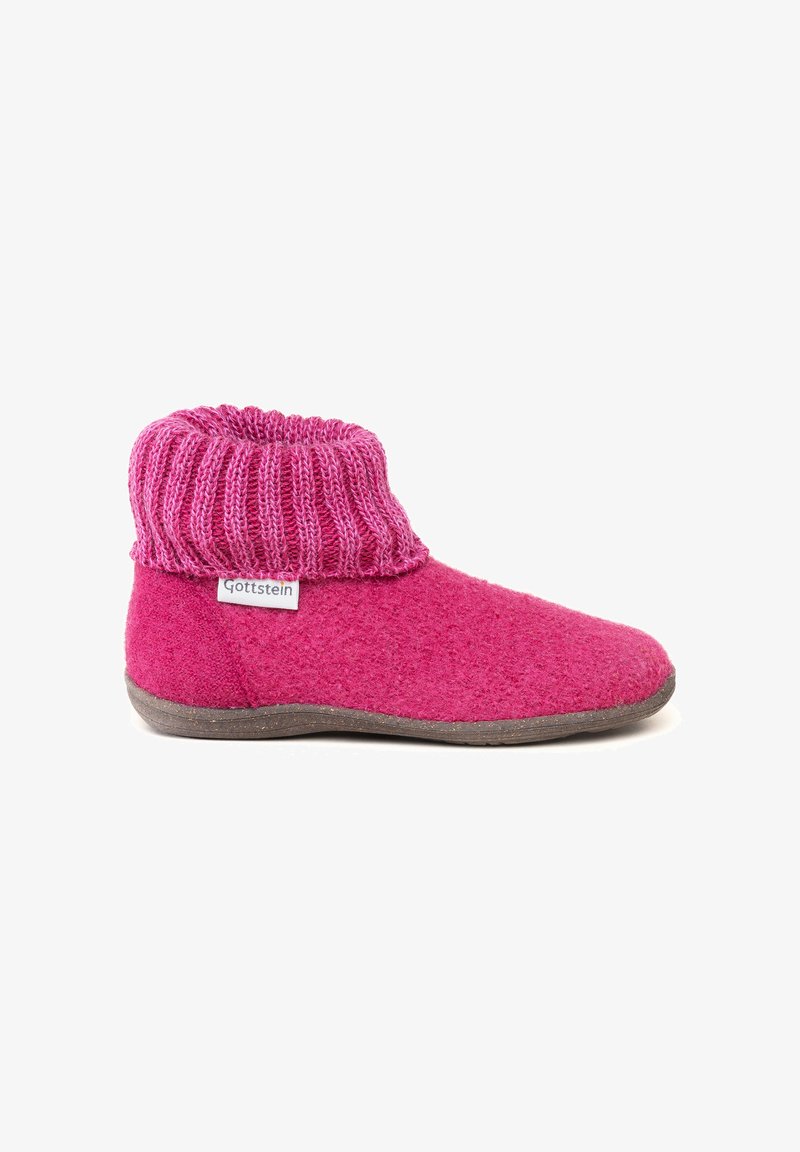 Uldslippers med ribbad strikkrand i lysende pink. Polstret sål med tekstureret finish og et lille stofmærke på siden.