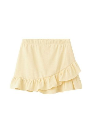 Mini-jupe beige clair avec taille élastique et ourlet asymétrique à volants.