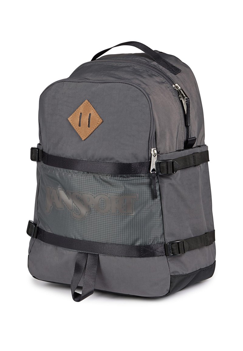 dark gray jansport backpack Graphite Grey SUPERBREAK Wipe down the inside and outside of your bag using mild soap JanSport Cross Town Plus Backpack