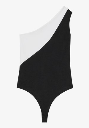 Costum de baie cu un umăr, având un design in două culori, cu negru pe o parte și alb pe cealaltă. Fabricat dintr-un material neted, cu o croială îndrăzneață.