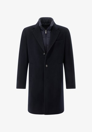 Námořnický modrý vlněný kabát s přiléhavým vnitřním podšíváním, klopovými límci, dvěma předními kapsami a zapínáním na jeden knoflík.
