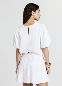 Calliope Gonna a campana - bianco ottico