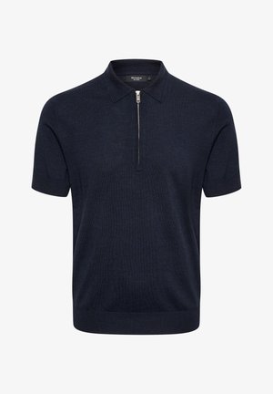 Polo a maniche corte blu navy in tessuto a maglia, con zip frontale, colletto classico e orlo dritto con polsini a coste.