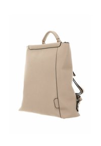 Beige leather backpack with a structured design, featuring a top handle, black trim, and adjustable shoulder straps. Zipper closure and side pocket.