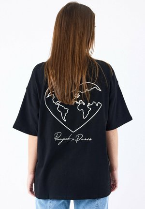 MOTIF COEURMONDE - Camiseta estampada - noir