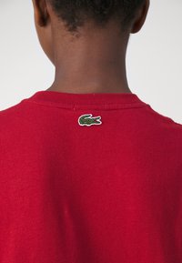 Lacoste UNISEX - Camiseta estampada - ora