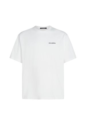 T-shirt bianca in cotone con scollatura rotonda, maniche corte e un logo minimalista in nero "KARL LAGERFELD" nella zona sinistra del petto.