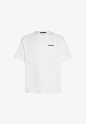 T-shirt bianca in cotone con scollatura rotonda, maniche corte e un logo minimalista in nero "KARL LAGERFELD" nella zona sinistra del petto.