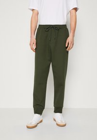 BOSS HADIKO - Treniņtērpa apakšdaļas - open green