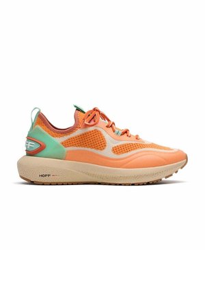 Orange mesh running shoe with beige accents, green heel detail, textured surface, lace-up design, and branded logo on the side.