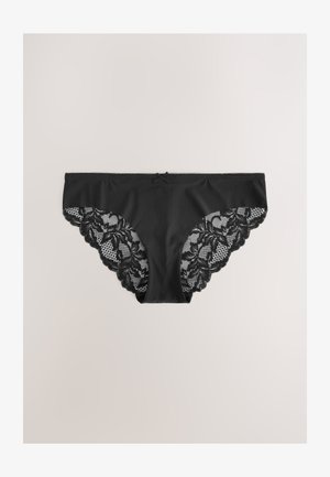 Mustad aluspüksid, millel on sile esikülg ja keerukad musta pitsi külgpaneelid, millel on lillemustrid ja vöökohal paela detail.