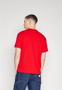Tommy Jeans Camiseta básica - deep crimson