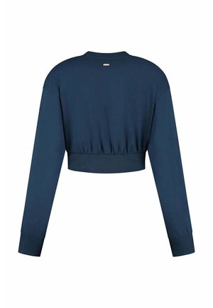 Korte navy sweatshirt met lange mouwen, geribbelde manchetten en zoom. Eenvoudig ontwerp met een label op de achterkant van de hals, gemaakt van zachte stof.